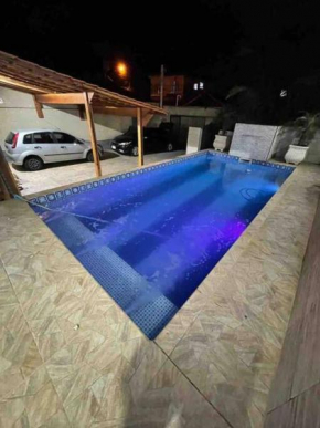 Casa com piscina Praia Grande. Carnaval disponivel